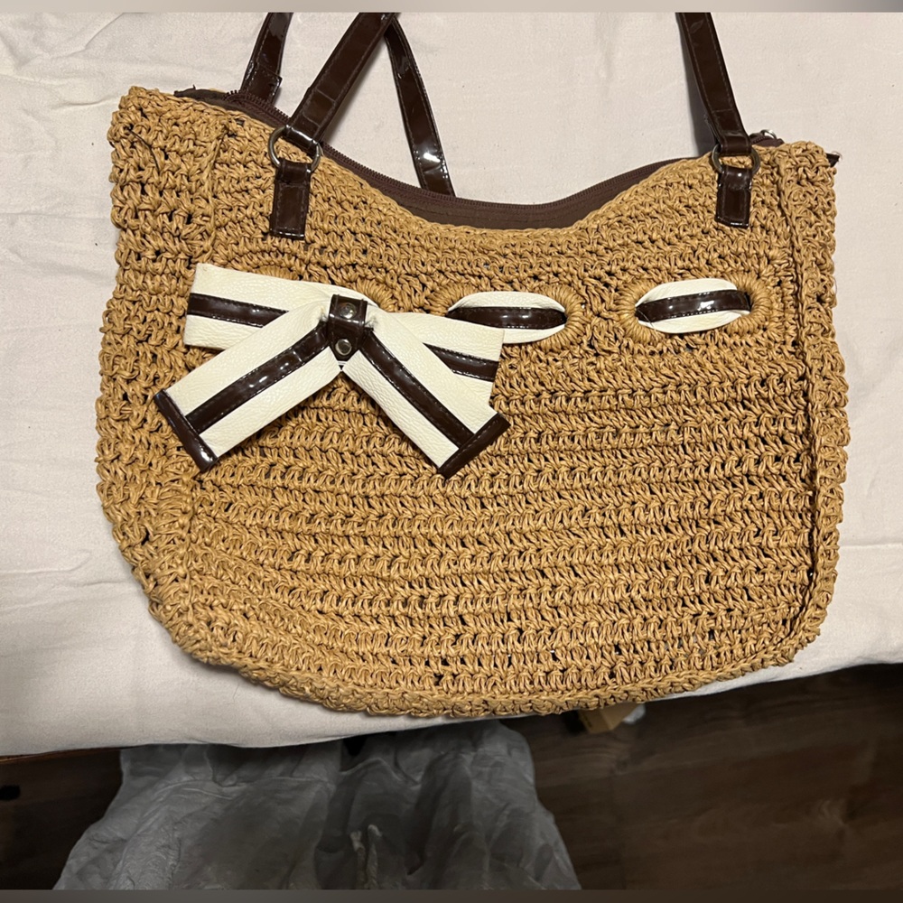 Woven sand color bag with leather white bow